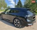 Черный БМВ iX, объемом двигателя 0 л и пробегом 16 тыс. км за 82900 $, фото 6 на Automoto.ua