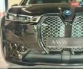 Черный БМВ iX, объемом двигателя 0 л и пробегом 62 тыс. км за 60390 $, фото 2 на Automoto.ua