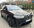 Черный БМВ iX, объемом двигателя 0 л и пробегом 55 тыс. км за 51500 $, фото 1 на Automoto.ua