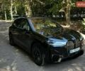 Черный БМВ iX, объемом двигателя 0 л и пробегом 59 тыс. км за 52500 $, фото 1 на Automoto.ua