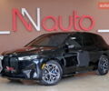 Черный БМВ iX, объемом двигателя 0 л и пробегом 10 тыс. км за 61400 $, фото 1 на Automoto.ua
