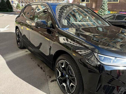 Черный БМВ iX, объемом двигателя 0 л и пробегом 12 тыс. км за 59999 $, фото 1 на Automoto.ua