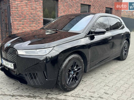 Черный БМВ iX, объемом двигателя 0 л и пробегом 55 тыс. км за 51500 $, фото 1 на Automoto.ua