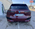 Красный БМВ iX, объемом двигателя 0 л и пробегом 43 тыс. км за 73999 $, фото 2 на Automoto.ua