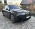 Серый БМВ iX, объемом двигателя 0 л и пробегом 37 тыс. км за 51500 $, фото 1 на Automoto.ua