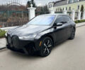 Серый БМВ iX, объемом двигателя 0 л и пробегом 38 тыс. км за 49700 $, фото 1 на Automoto.ua