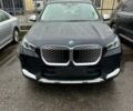 Черный БМВ iX1, объемом двигателя 0 л и пробегом 28 тыс. км за 28500 $, фото 1 на Automoto.ua