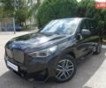 Черный БМВ iX1, объемом двигателя 0 л и пробегом 5 тыс. км за 44537 $, фото 1 на Automoto.ua