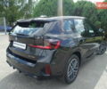 Черный БМВ iX1, объемом двигателя 0 л и пробегом 5 тыс. км за 44537 $, фото 3 на Automoto.ua
