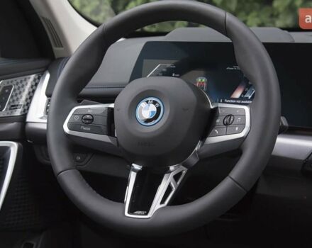 купить новое авто БМВ iX1 2025 года от официального дилера E-MOTION CARS БМВ фото