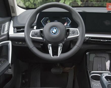 купить новое авто БМВ iX1 2025 года от официального дилера E-MOTION CARS БМВ фото