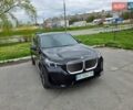 Синий БМВ iX1, объемом двигателя 0 л и пробегом 33 тыс. км за 31000 $, фото 1 на Automoto.ua