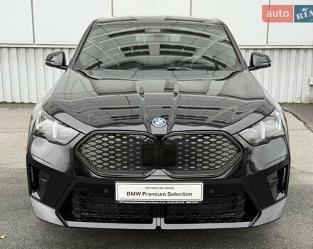 Черный БМВ iX2, объемом двигателя 0 л и пробегом 2 тыс. км за 53666 $, фото 1 на Automoto.ua