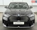 Черный БМВ iX2, объемом двигателя 0 л и пробегом 2 тыс. км за 53666 $, фото 1 на Automoto.ua