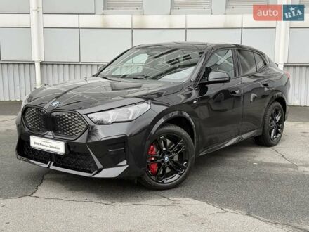 Черный БМВ iX2, объемом двигателя 0 л и пробегом 2 тыс. км за 53666 $, фото 1 на Automoto.ua