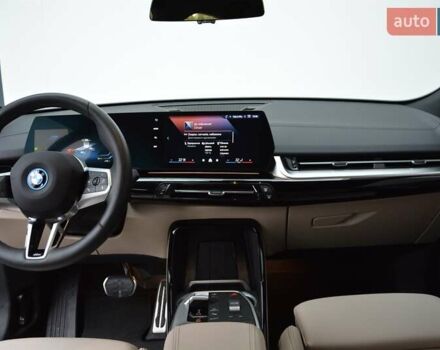 Красный БМВ iX2, объемом двигателя 0 л и пробегом 9 тыс. км за 53143 $, фото 5 на Automoto.ua