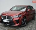 Красный БМВ iX2, объемом двигателя 0 л и пробегом 9 тыс. км за 53143 $, фото 1 на Automoto.ua
