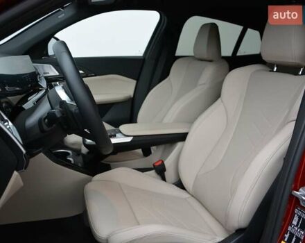 Красный БМВ iX2, объемом двигателя 0 л и пробегом 9 тыс. км за 53143 $, фото 3 на Automoto.ua