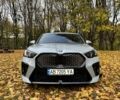 Серый БМВ iX2, объемом двигателя 0 л и пробегом 2 тыс. км за 61455 $, фото 1 на Automoto.ua