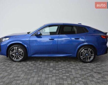 Синий БМВ iX2, объемом двигателя 0 л и пробегом 3 тыс. км за 52261 $, фото 1 на Automoto.ua