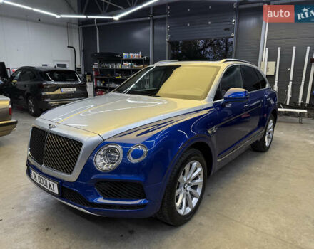 Синий Бентли Бентайга, объемом двигателя 3.96 л и пробегом 110 тыс. км за 140000 $, фото 2 на Automoto.ua
