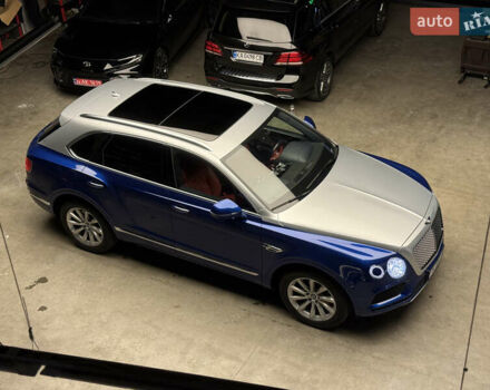 Синий Бентли Бентайга, объемом двигателя 3.96 л и пробегом 110 тыс. км за 140000 $, фото 18 на Automoto.ua