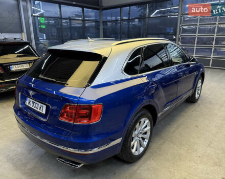 Синий Бентли Бентайга, объемом двигателя 3.96 л и пробегом 110 тыс. км за 140000 $, фото 4 на Automoto.ua