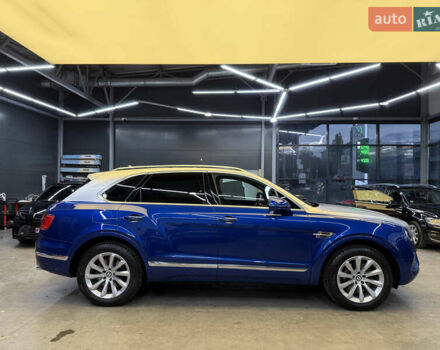 Синий Бентли Бентайга, объемом двигателя 3.96 л и пробегом 110 тыс. км за 140000 $, фото 3 на Automoto.ua
