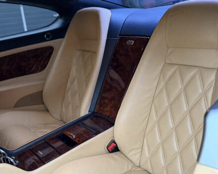 Черный Бентли Континенталь ГТ, объемом двигателя 6 л и пробегом 81 тыс. км за 24000 $, фото 11 на Automoto.ua