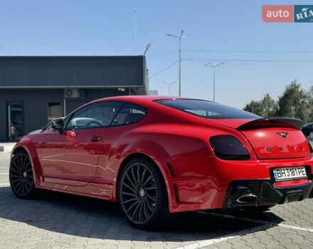 Червоний Бентлі Continental, об'ємом двигуна 6 л та пробігом 77 тис. км за 37999 $, фото 10 на Automoto.ua