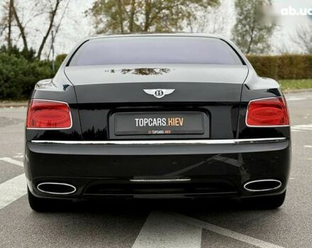 Бентли Флаинг Спур, объемом двигателя 6 л и пробегом 62 тыс. км за 61800 $, фото 14 на Automoto.ua
