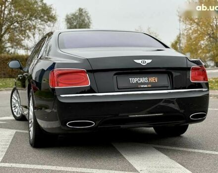 Бентли Флаинг Спур, объемом двигателя 6 л и пробегом 62 тыс. км за 61800 $, фото 13 на Automoto.ua