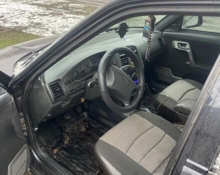 Черный Богдан 2110, объемом двигателя 1.6 л и пробегом 3 тыс. км за 2100 $, фото 6 на Automoto.ua