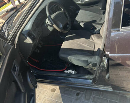 Черный Богдан 2110, объемом двигателя 1.6 л и пробегом 142 тыс. км за 2800 $, фото 2 на Automoto.ua