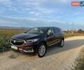 Красный Бьюик Энклейв, объемом двигателя 3.56 л и пробегом 112 тыс. км за 25000 $, фото 1 на Automoto.ua