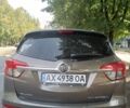 Коричневый Бьюик Envision, объемом двигателя 2.4 л и пробегом 129 тыс. км за 13800 $, фото 2 на Automoto.ua