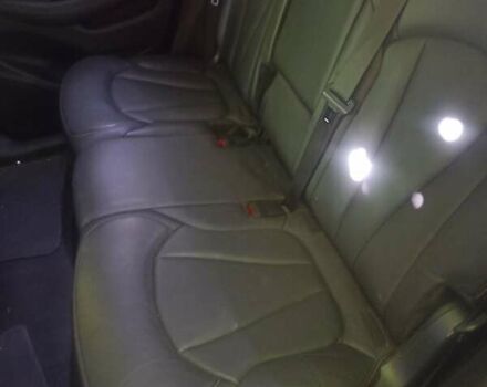 Коричневый Бьюик Envision, объемом двигателя 2.4 л и пробегом 129 тыс. км за 13600 $, фото 4 на Automoto.ua