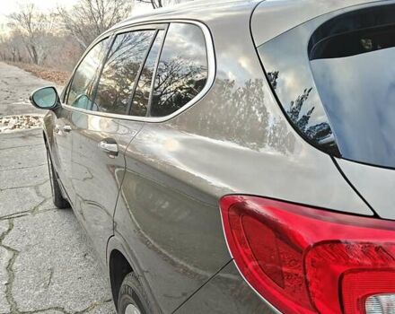 Коричневый Бьюик Envision, объемом двигателя 2.46 л и пробегом 141 тыс. км за 15000 $, фото 3 на Automoto.ua