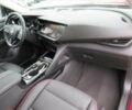 Красный Бьюик Envision, объемом двигателя 2 л и пробегом 11 тыс. км за 10600 $, фото 6 на Automoto.ua
