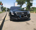 Чорний Каділак АТС, об'ємом двигуна 2 л та пробігом 148 тис. км за 12600 $, фото 1 на Automoto.ua