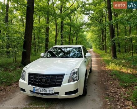Білий Каділак CTS, об'ємом двигуна 3 л та пробігом 185 тис. км за 7700 $, фото 1 на Automoto.ua