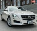 Белый Кадиллак СТС, объемом двигателя 2 л и пробегом 230 тыс. км за 9999 $, фото 1 на Automoto.ua