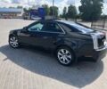 Черный Кадиллак СТС, объемом двигателя 3.6 л и пробегом 235 тыс. км за 6000 $, фото 1 на Automoto.ua