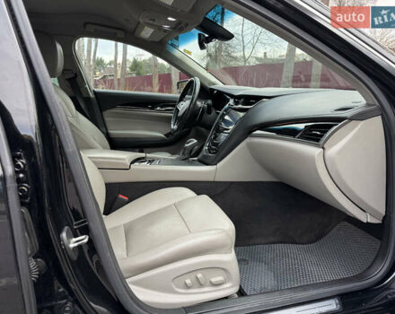 Черный Кадиллак СТС, объемом двигателя 2 л и пробегом 189 тыс. км за 9999 $, фото 19 на Automoto.ua