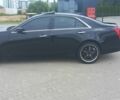 Черный Кадиллак СТС, объемом двигателя 2 л и пробегом 319 тыс. км за 13700 $, фото 1 на Automoto.ua