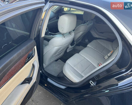 Черный Кадиллак СТС, объемом двигателя 2 л и пробегом 260 тыс. км за 10100 $, фото 6 на Automoto.ua