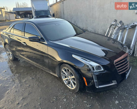 Черный Кадиллак СТС, объемом двигателя 2 л и пробегом 260 тыс. км за 10100 $, фото 1 на Automoto.ua