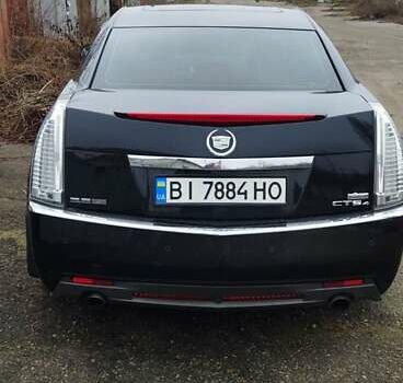 Черный Кадиллак СТС, объемом двигателя 3.6 л и пробегом 235 тыс. км за 7000 $, фото 1 на Automoto.ua