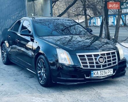 Черный Кадиллак СТС, объемом двигателя 3 л и пробегом 240 тыс. км за 7499 $, фото 1 на Automoto.ua