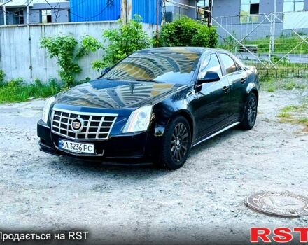 Черный Кадиллак СТС, объемом двигателя 3 л и пробегом 203 тыс. км за 7700 $, фото 1 на Automoto.ua